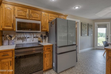 Immaculate Home with Golf Course Views in Loma Linda! This on The Bald Eagle Course At Eagle Creek Golf Club in Missouri - for sale on GolfHomes.com, golf home, golf lot