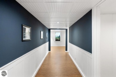 This brilliantly restored home delivers comfort, charm, and on Charlevoix Golf Club in Michigan - for sale on GolfHomes.com, golf home, golf lot