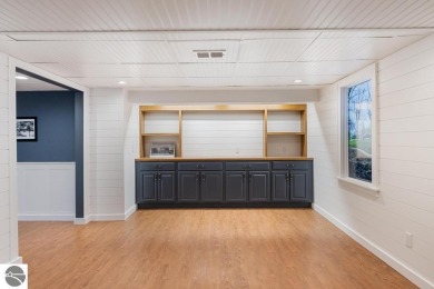 This brilliantly restored home delivers comfort, charm, and on Charlevoix Golf Club in Michigan - for sale on GolfHomes.com, golf home, golf lot