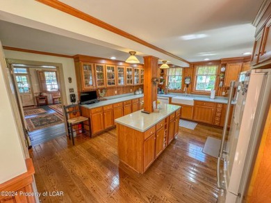 Stunning 6-bed, 5-bath farmhouse beautifully situated on almost on Valley Country Club in Pennsylvania - for sale on GolfHomes.com, golf home, golf lot