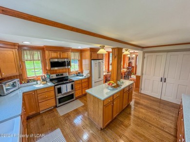 Stunning 6-bed, 5-bath farmhouse beautifully situated on almost on Valley Country Club in Pennsylvania - for sale on GolfHomes.com, golf home, golf lot