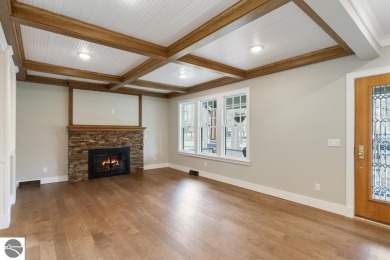 This brilliantly restored home delivers comfort, charm, and on Charlevoix Golf Club in Michigan - for sale on GolfHomes.com, golf home, golf lot