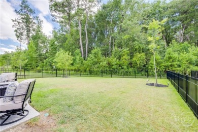 Welcome to your forever home nestled in a secure gated community on Savannah Quarters Country Club in Georgia - for sale on GolfHomes.com, golf home, golf lot