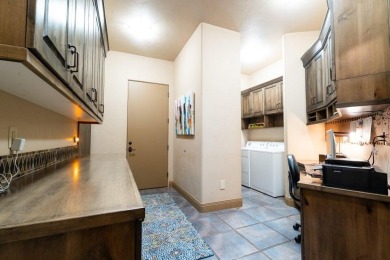 Welcome to this stunning single-level home in the gated Entrada on Entrada at Snow Canyon in Utah - for sale on GolfHomes.com, golf home, golf lot