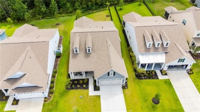 Welcome to your forever home nestled in a secure gated community on Savannah Quarters Country Club in Georgia - for sale on GolfHomes.com, golf home, golf lot