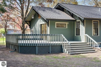 This brilliantly restored home delivers comfort, charm, and on Charlevoix Golf Club in Michigan - for sale on GolfHomes.com, golf home, golf lot