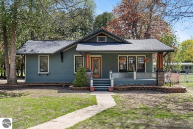 This brilliantly restored home delivers comfort, charm, and on Charlevoix Golf Club in Michigan - for sale on GolfHomes.com, golf home, golf lot
