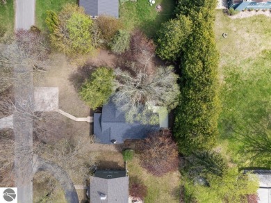 This brilliantly restored home delivers comfort, charm, and on Charlevoix Golf Club in Michigan - for sale on GolfHomes.com, golf home, golf lot