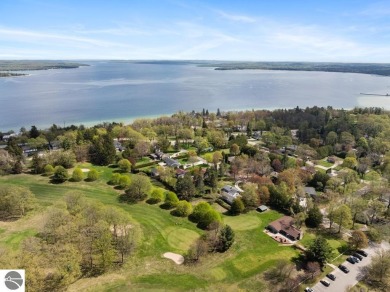 This brilliantly restored home delivers comfort, charm, and on Charlevoix Golf Club in Michigan - for sale on GolfHomes.com, golf home, golf lot