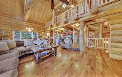 One of a kind, hand, crafted log home with extraordinary views on Lake Almanor Country Club in California - for sale on GolfHomes.com, golf home, golf lot