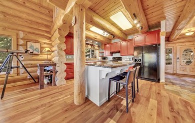 One of a kind, hand, crafted log home with extraordinary views on Lake Almanor Country Club in California - for sale on GolfHomes.com, golf home, golf lot