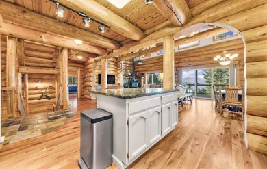 One of a kind, hand, crafted log home with extraordinary views on Lake Almanor Country Club in California - for sale on GolfHomes.com, golf home, golf lot