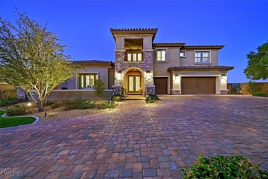 NESTLED ON A .47-ACRE HOMESITE WITHIN A DOUBLE-GATED ENCLAVE OF on Southern Highlands Golf Club in Nevada - for sale on GolfHomes.com, golf home, golf lot