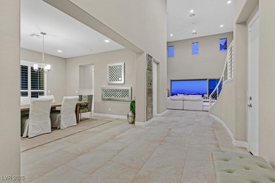 NESTLED ON A .47-ACRE HOMESITE WITHIN A DOUBLE-GATED ENCLAVE OF on Southern Highlands Golf Club in Nevada - for sale on GolfHomes.com, golf home, golf lot