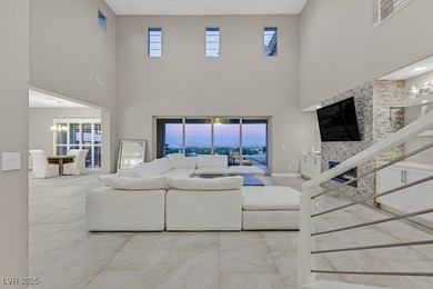 NESTLED ON A .47-ACRE HOMESITE WITHIN A DOUBLE-GATED ENCLAVE OF on Southern Highlands Golf Club in Nevada - for sale on GolfHomes.com, golf home, golf lot