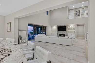 NESTLED ON A .47-ACRE HOMESITE WITHIN A DOUBLE-GATED ENCLAVE OF on Southern Highlands Golf Club in Nevada - for sale on GolfHomes.com, golf home, golf lot