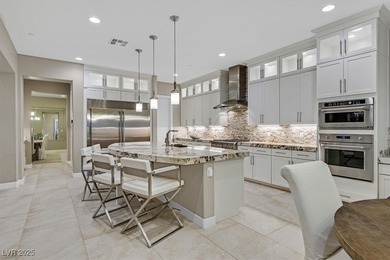 NESTLED ON A .47-ACRE HOMESITE WITHIN A DOUBLE-GATED ENCLAVE OF on Southern Highlands Golf Club in Nevada - for sale on GolfHomes.com, golf home, golf lot