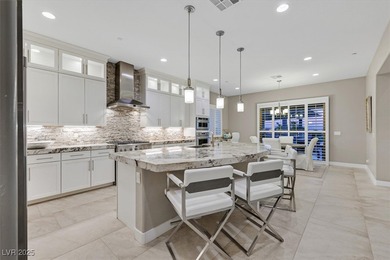 NESTLED ON A .47-ACRE HOMESITE WITHIN A DOUBLE-GATED ENCLAVE OF on Southern Highlands Golf Club in Nevada - for sale on GolfHomes.com, golf home, golf lot