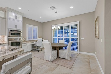 NESTLED ON A .47-ACRE HOMESITE WITHIN A DOUBLE-GATED ENCLAVE OF on Southern Highlands Golf Club in Nevada - for sale on GolfHomes.com, golf home, golf lot