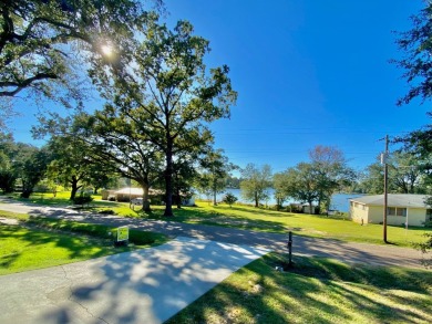 Elegant Arched views of Dogwood Lake presents both peace and on Dogwood Lakes Golf Club in Florida - for sale on GolfHomes.com, golf home, golf lot