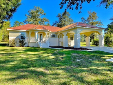 Elegant Arched views of Dogwood Lake presents both peace and on Dogwood Lakes Golf Club in Florida - for sale on GolfHomes.com, golf home, golf lot