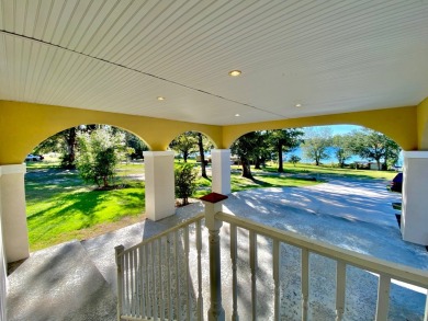 Elegant Arched views of Dogwood Lake presents both peace and on Dogwood Lakes Golf Club in Florida - for sale on GolfHomes.com, golf home, golf lot