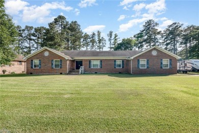 Large brick ranch in the heart of Elizabeth City with golf on The Pines At Elizabeth City in North Carolina - for sale on GolfHomes.com, golf home, golf lot