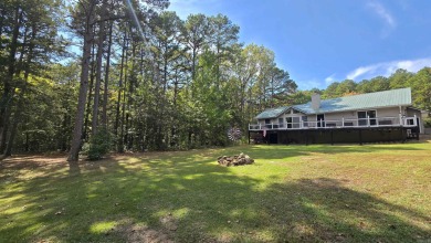 Discover your dream home in the heart of Fairfield Bay's resort on Mountain Ranch Golf Club in Arkansas - for sale on GolfHomes.com, golf home, golf lot