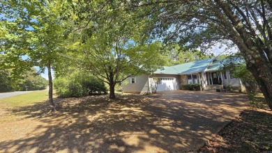 Discover your dream home in the heart of Fairfield Bay's resort on Mountain Ranch Golf Club in Arkansas - for sale on GolfHomes.com, golf home, golf lot