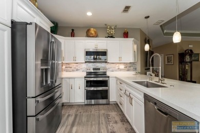 Exquisitely remodeled 3BR/2BA villa in the gated SPI Golf on South Padre Island Golf Club in Texas - for sale on GolfHomes.com, golf home, golf lot
