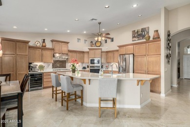 Highly upgraded and exceptionally spacious Marbella model tucked on Tuscany Falls At Pebble Creek in Arizona - for sale on GolfHomes.com, golf home, golf lot