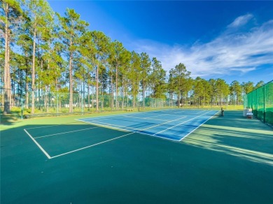 This beautiful home features 4 bedrooms and 3 bathrooms, plus a on Highlands Reserve Golf Club in Florida - for sale on GolfHomes.com, golf home, golf lot