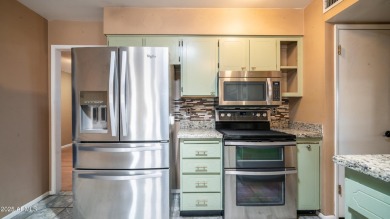 Discover comfort and convenience in this delightful 2 bedroom 1 on Union Hills Country Club in Arizona - for sale on GolfHomes.com, golf home, golf lot