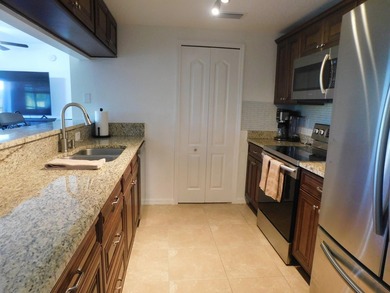 Discover the perfect blend of comfort and convenience in this on Gator Trace Golf and Country Club in Florida - for sale on GolfHomes.com, golf home, golf lot