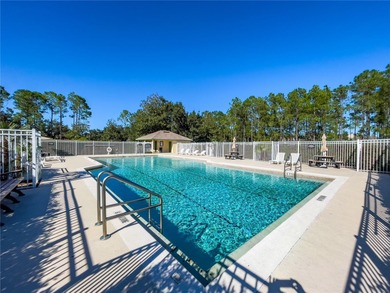 This beautiful home features 4 bedrooms and 3 bathrooms, plus a on Highlands Reserve Golf Club in Florida - for sale on GolfHomes.com, golf home, golf lot