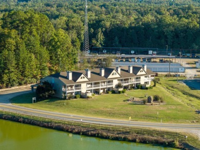 A part of the Diamondhead Community this 2/2 condo has covered on Diamondhead Golf and Country Club in Arkansas - for sale on GolfHomes.com, golf home, golf lot