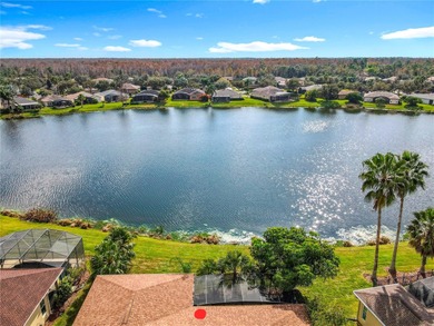 Stunning OPERETTA model on a HUGE POND in the Terra Vista on Stonegate Golf Club in Florida - for sale on GolfHomes.com, golf home, golf lot