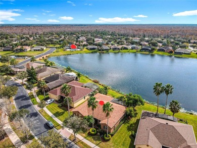 Stunning OPERETTA model on a HUGE POND in the Terra Vista on Stonegate Golf Club in Florida - for sale on GolfHomes.com, golf home, golf lot