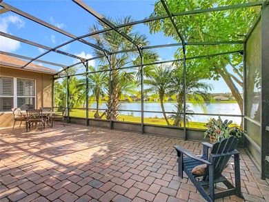 Stunning OPERETTA model on a HUGE POND in the Terra Vista on Stonegate Golf Club in Florida - for sale on GolfHomes.com, golf home, golf lot