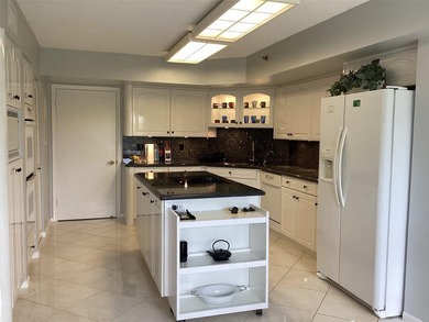 Custom-decorated 2nd-floor unit with neutral colors and two new on  in Florida - for sale on GolfHomes.com, golf home, golf lot