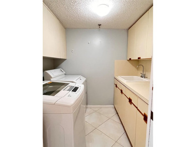 Custom-decorated 2nd-floor unit with neutral colors and two new on  in Florida - for sale on GolfHomes.com, golf home, golf lot