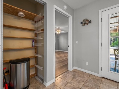 This 3-bedroom, 2-bath coastal home is a gem, on over half an on St. James Bay in Florida - for sale on GolfHomes.com, golf home, golf lot