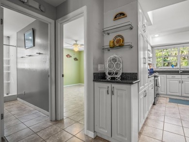 This 3-bedroom, 2-bath coastal home is a gem, on over half an on St. James Bay in Florida - for sale on GolfHomes.com, golf home, golf lot