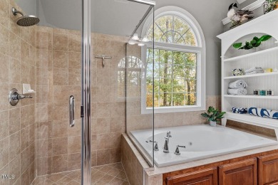 This exceptional home showcases impeccable craftsmanship and on Devils Ridge Golf Club in North Carolina - for sale on GolfHomes.com, golf home, golf lot