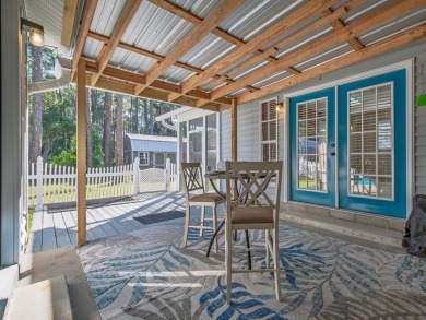 This 3-bedroom, 2-bath coastal home is a gem, on over half an on St. James Bay in Florida - for sale on GolfHomes.com, golf home, golf lot