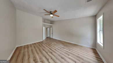 This renovated 3 bedroom, 2 bathroom home offers modern living on Mystery Valley Golf Course in Georgia - for sale on GolfHomes.com, golf home, golf lot