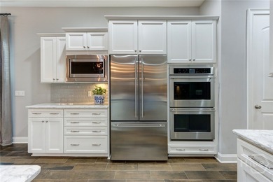 Welcome to this spacious move-in ready home that shows like a on Savannah Quarters Country Club in Georgia - for sale on GolfHomes.com, golf home, golf lot