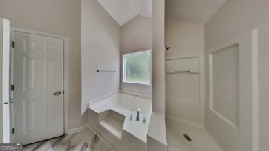 This renovated 3 bedroom, 2 bathroom home offers modern living on Mystery Valley Golf Course in Georgia - for sale on GolfHomes.com, golf home, golf lot