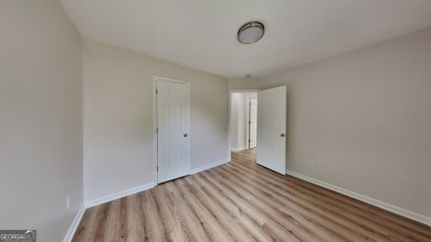 This renovated 3 bedroom, 2 bathroom home offers modern living on Mystery Valley Golf Course in Georgia - for sale on GolfHomes.com, golf home, golf lot