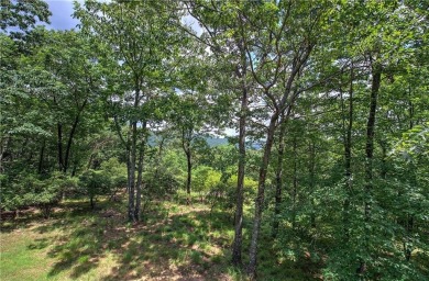 Step into this inviting ranch-style home, filled with natural on Bent Tree Golf Course in Georgia - for sale on GolfHomes.com, golf home, golf lot